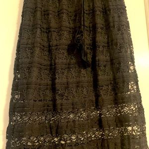 Woman’s summer Lacey long skirts with the short slip underneath.  Very cute